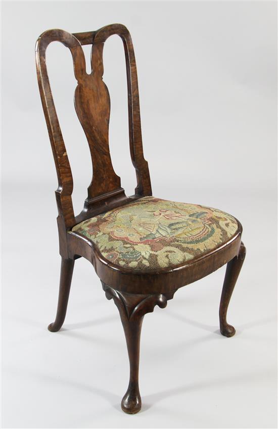 An early 18th century walnut side chair,